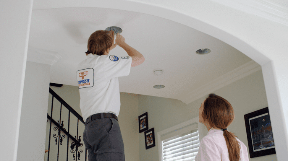 express electrician wiring lights on ceiling