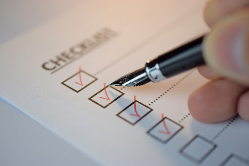 checklist-red-checks-ink-pen