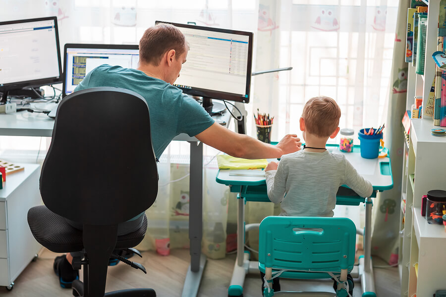 Father-With-Kid-Working-From-Home