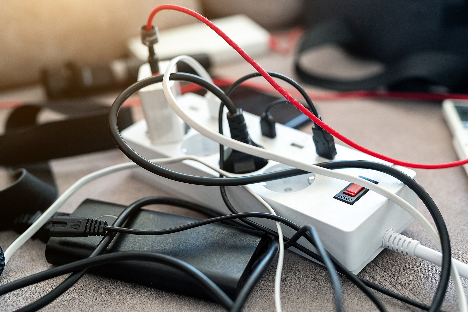 Overloaded Power Socket with Tangled Electric Cords